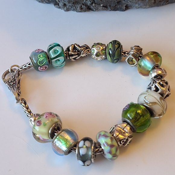 sterling silver charm bracelet full of charms marked 925 - Picture 2 of 4